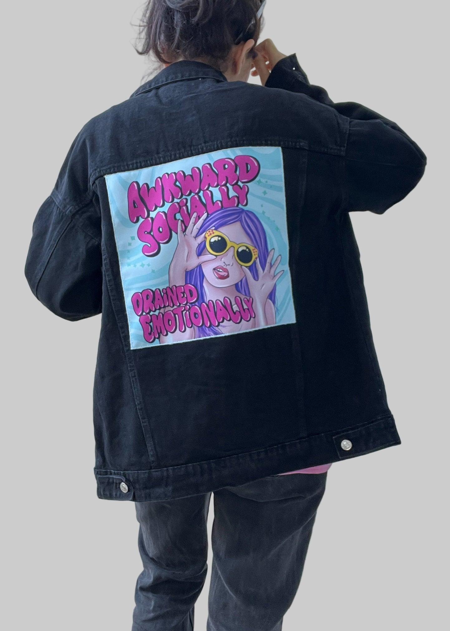 Streetwear denim jacket with colorful back patch design