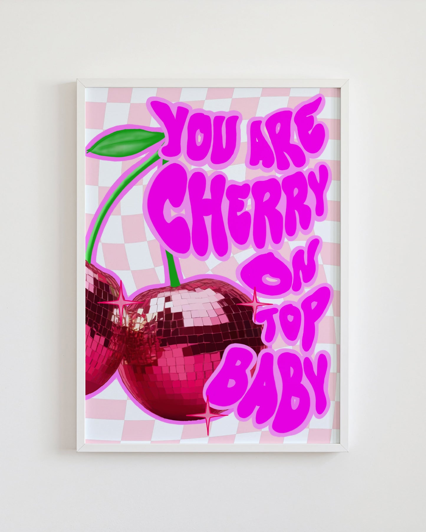 Framed artwork with a cherry and text 'You are cherry on top baby' on a checkered background.