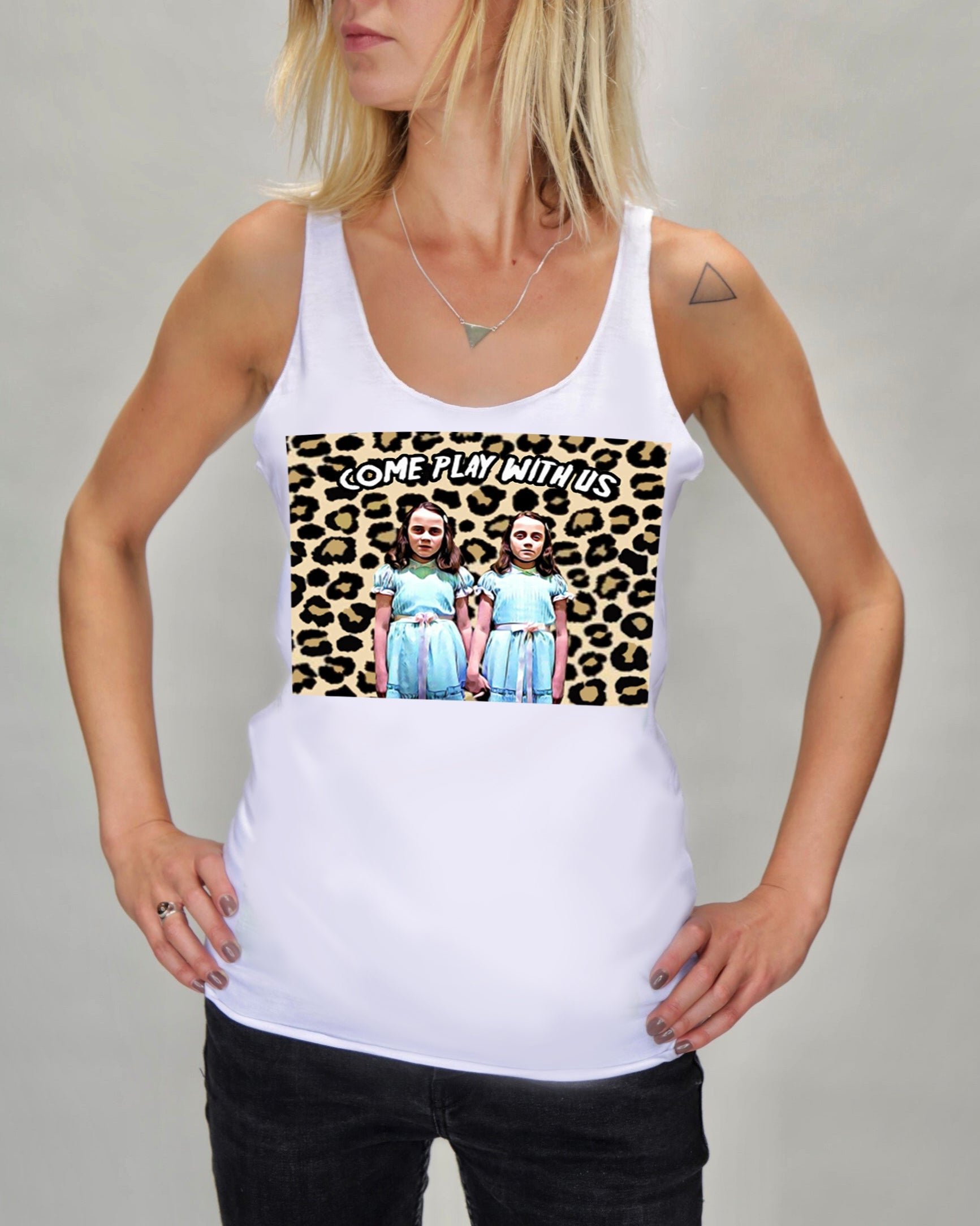 White tank top with a leopard print graphic and text worn by a person on a plain background