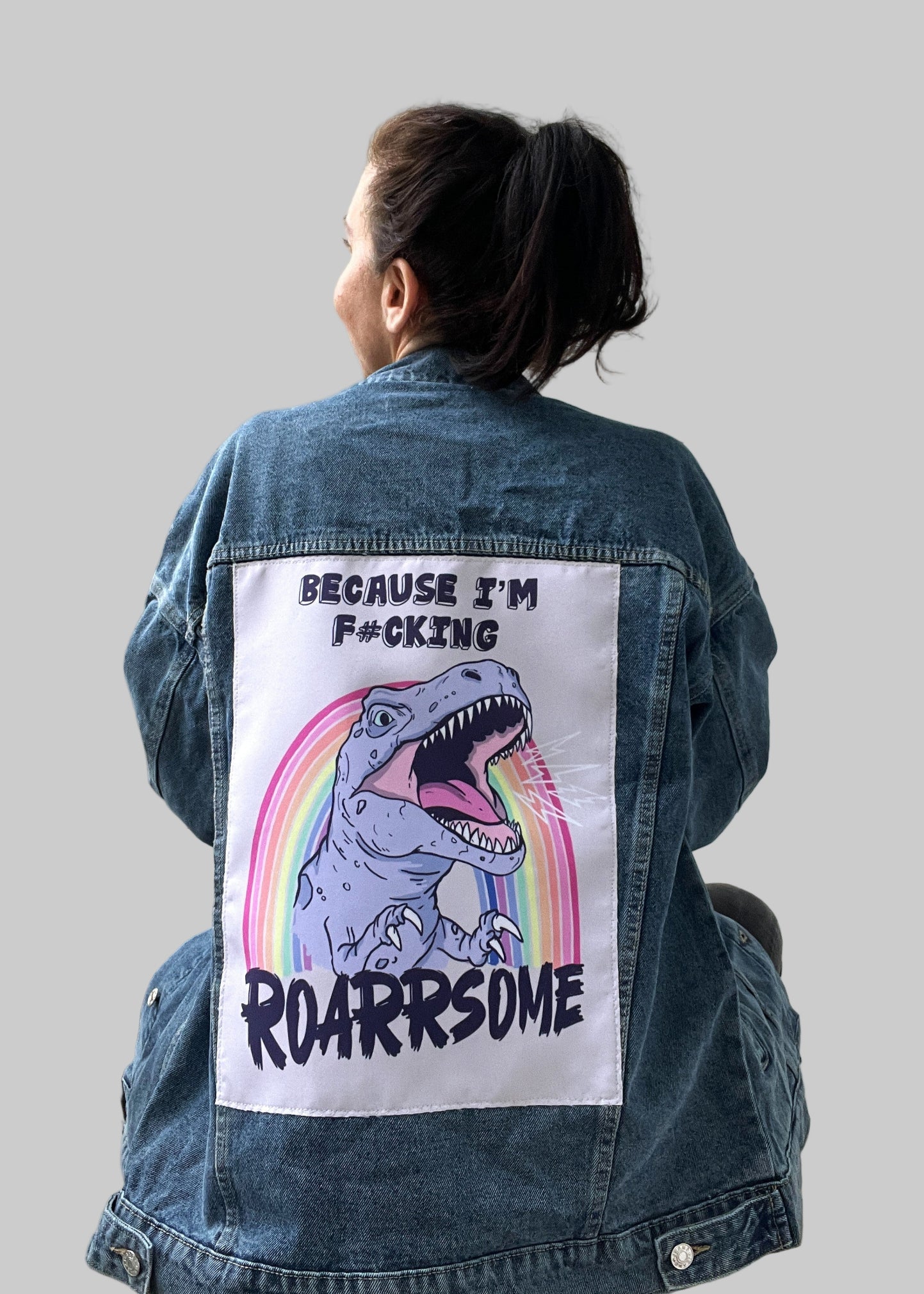 dinosaur-themed fabric patch for jacket customization