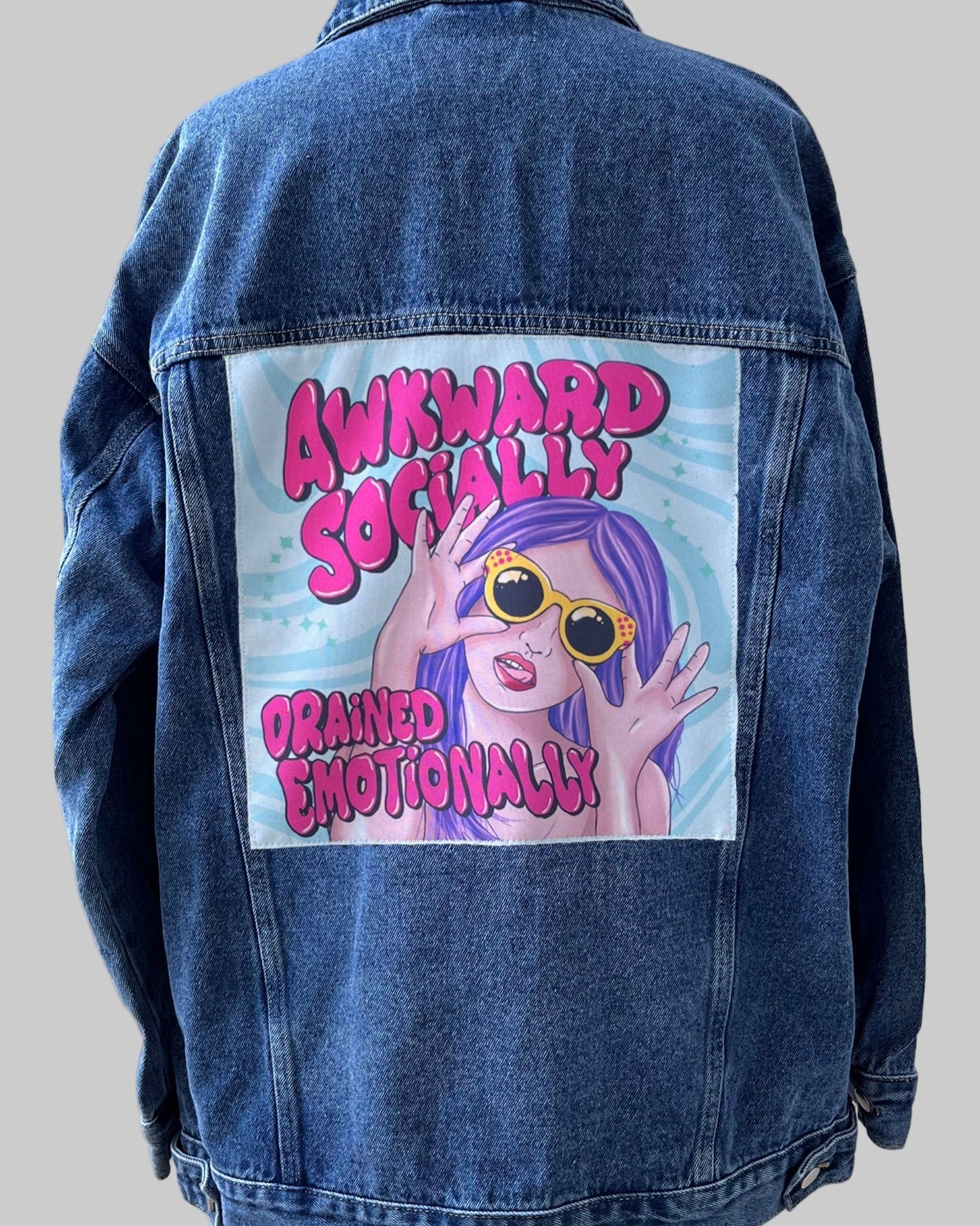 Streetwear denim jacket with colorful back patch design