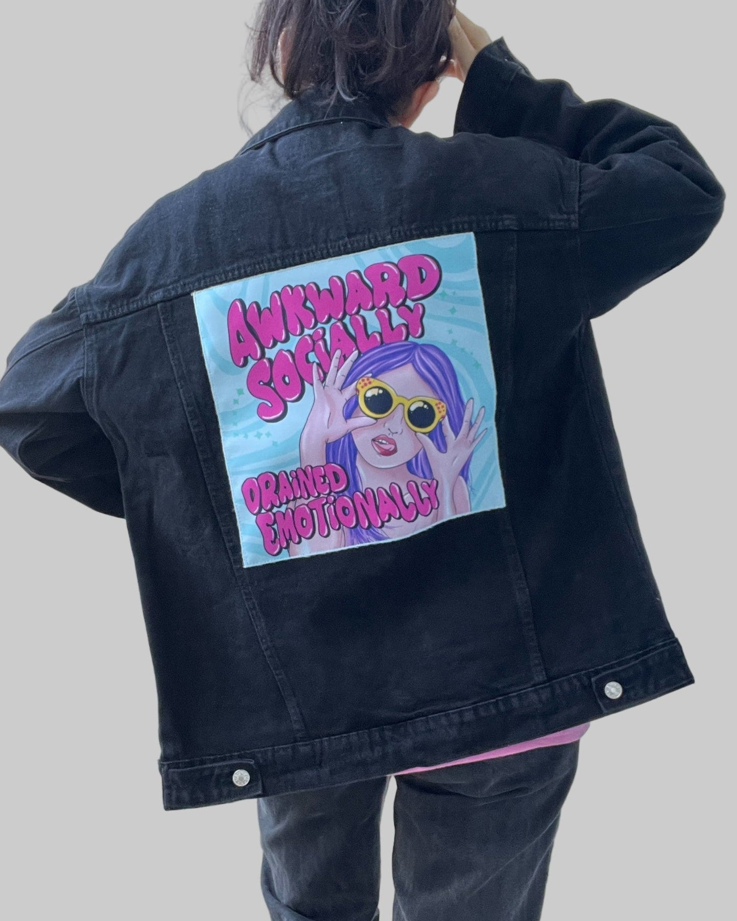 Streetwear denim jacket with colorful back patch design