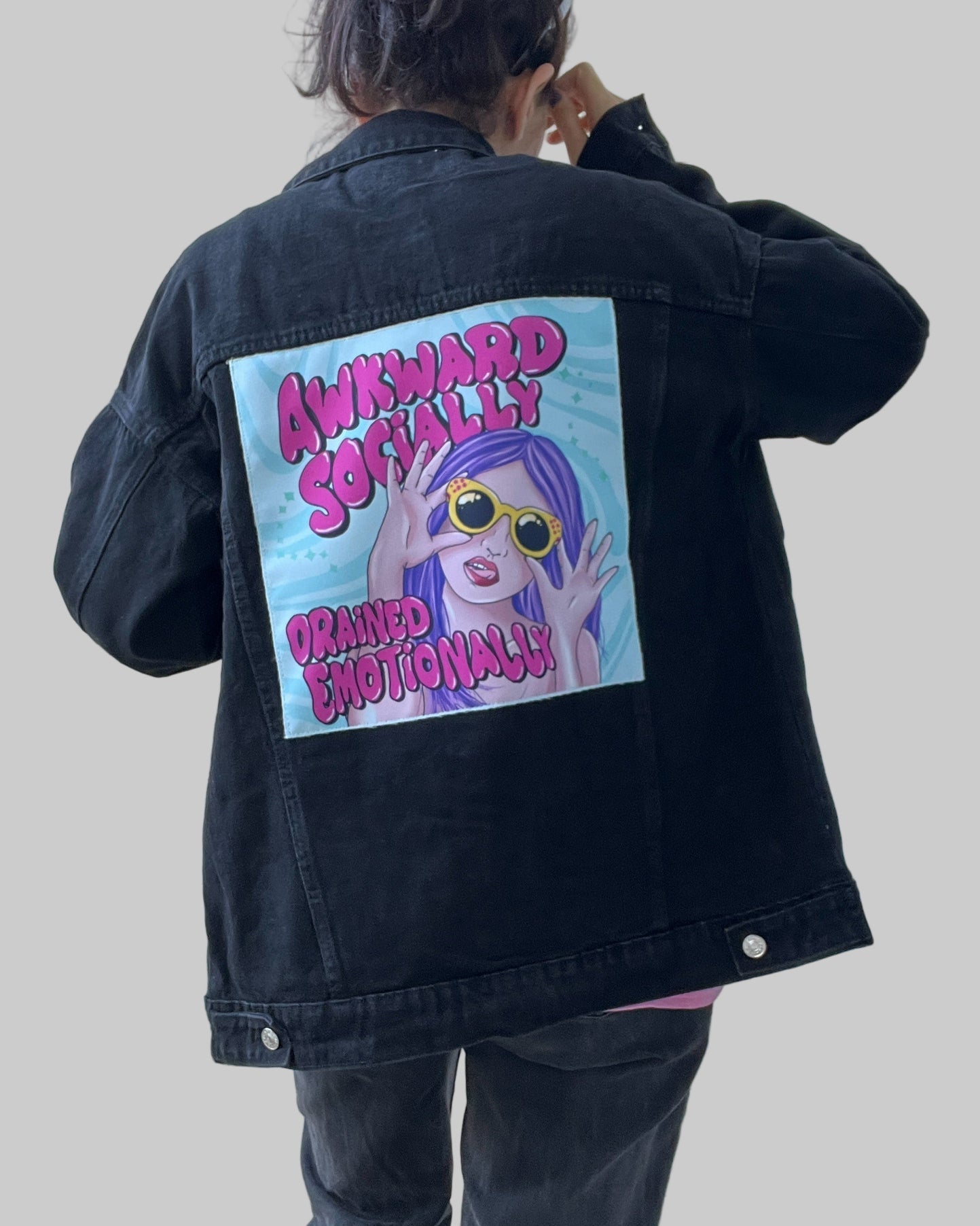 Streetwear denim jacket with colorful back patch design