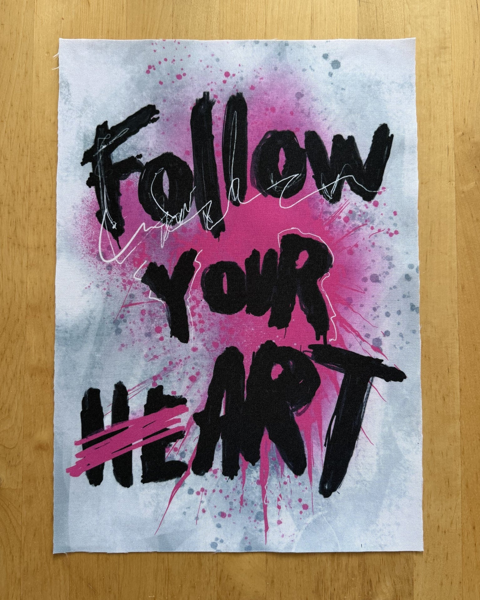 Motivational poster with 'Follow Your Heart' text on a pink and black abstract background