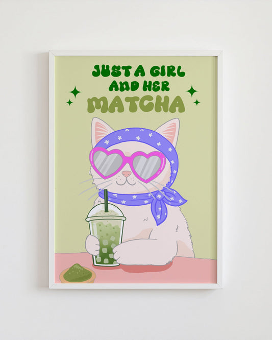 Framed artwork with a cat wearing sunglasses and a headband, holding a matcha drink, and text 'Just a Girl and Her Matcha' on a light green background.