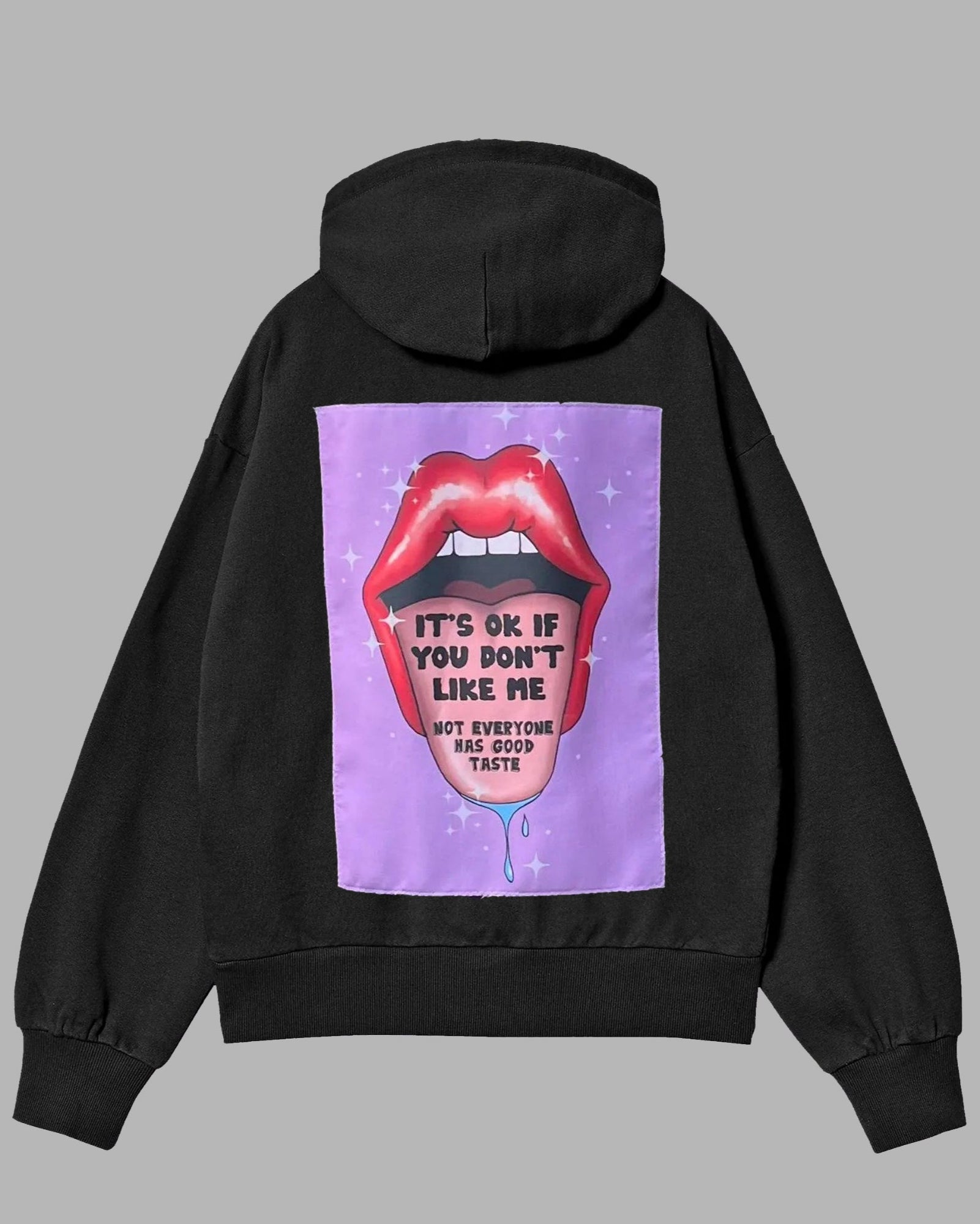 Black hoodie with a graphic of red lips and text on the back against a gray background