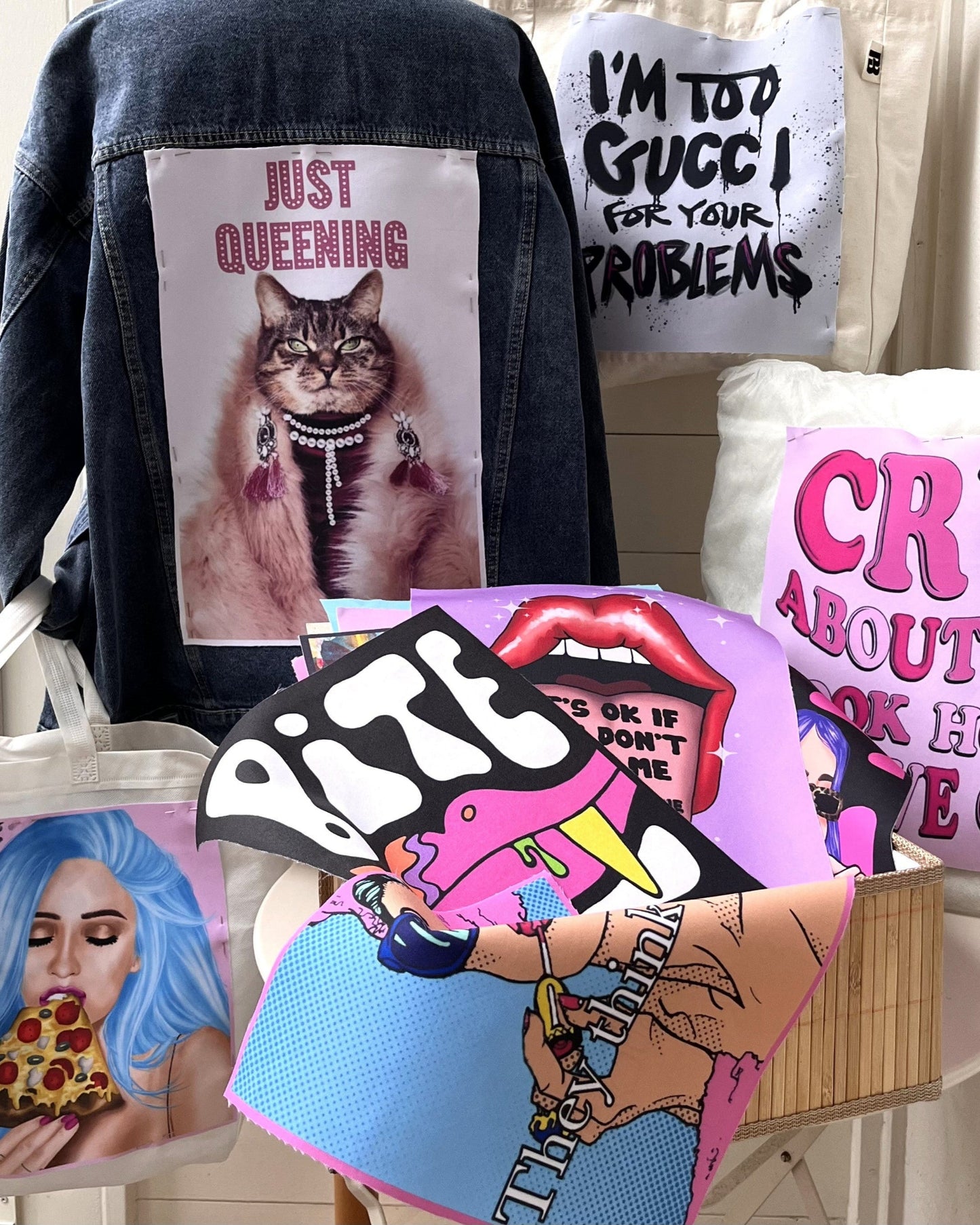 Collection of various graphic t-shirts and accessories with different designs and text.