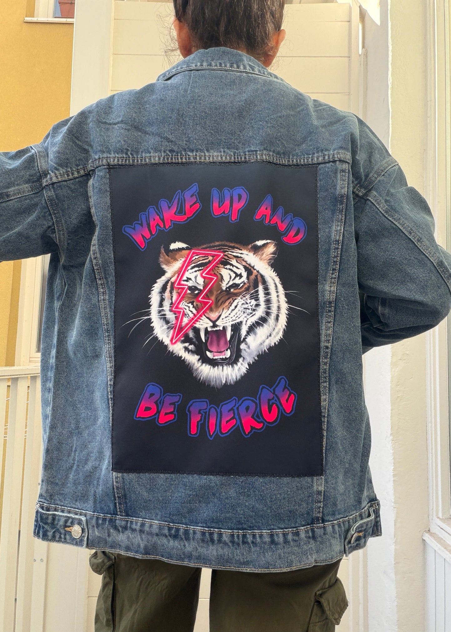 fierce tiger design on denim jacket