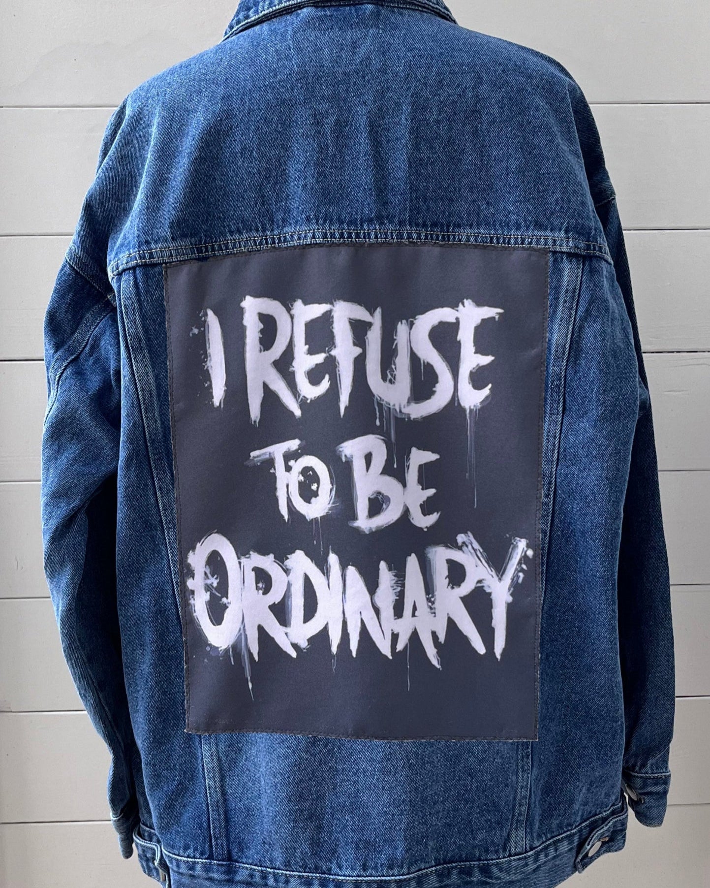Denim jacket Oversized blue with handmade fabric patch artwork on back