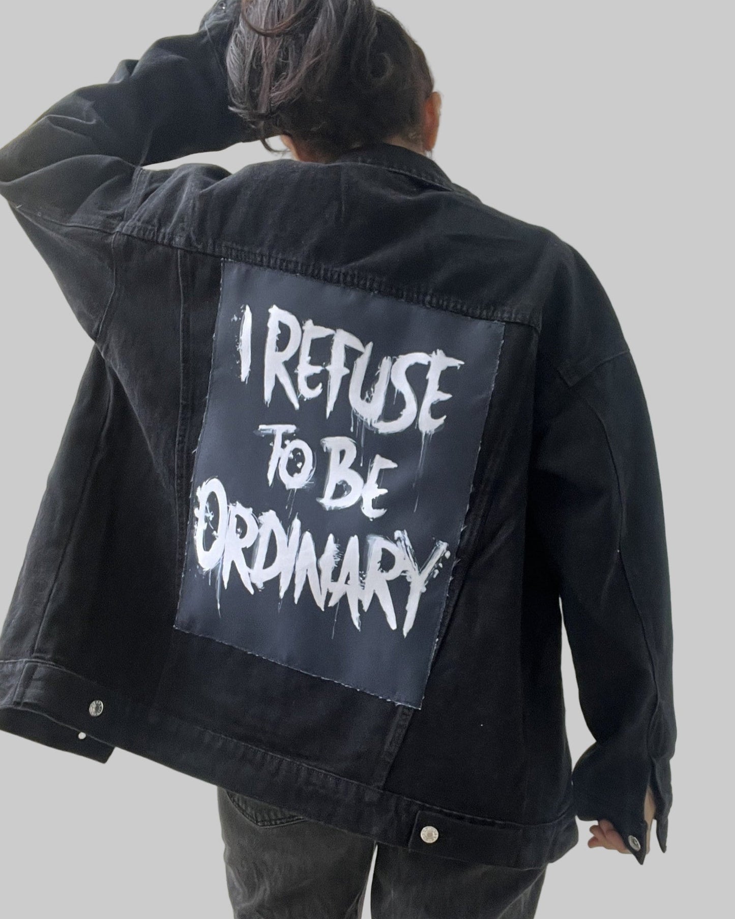 

“Custom denim jacket featuring abstract textile patch”

“Streetwear denim jacket with back patch design”