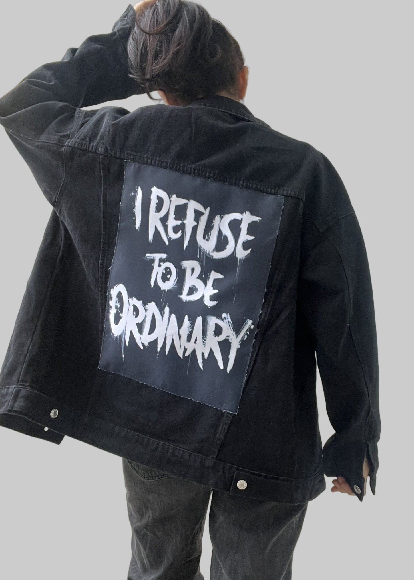 

“Custom denim jacket featuring abstract textile patch”

“Streetwear denim jacket with back patch design”