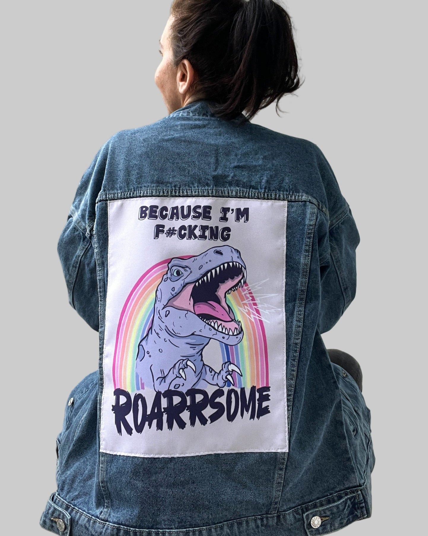 
dinosaur-themed fabric patch for jacket customization