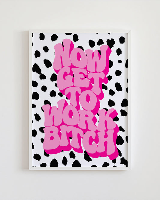 Framed artwork with pink text on a black and white polka dot background